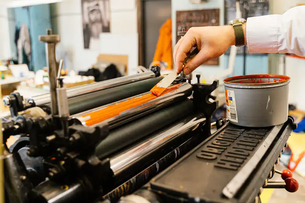 Close up of the platen press ink rollers