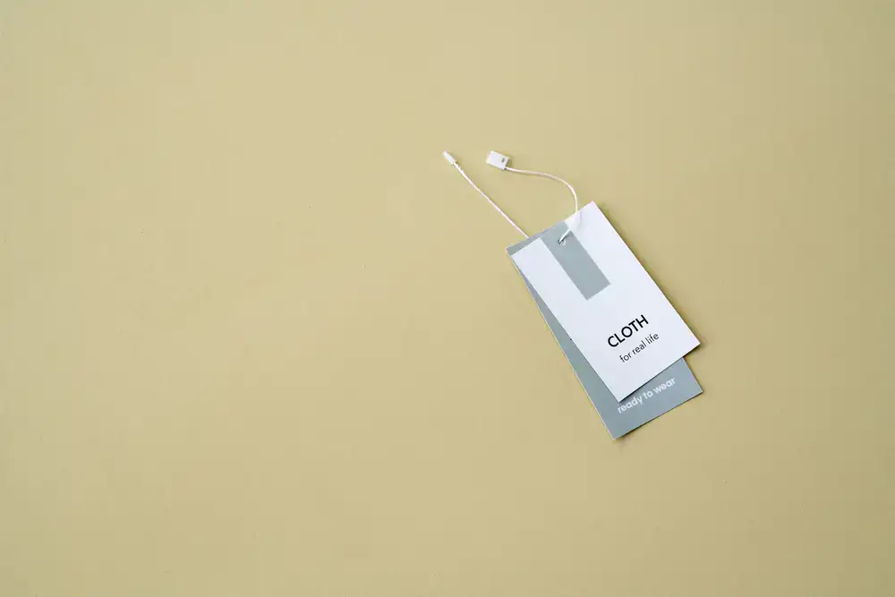 Letterpress swing tags for retail packaging attached with twine