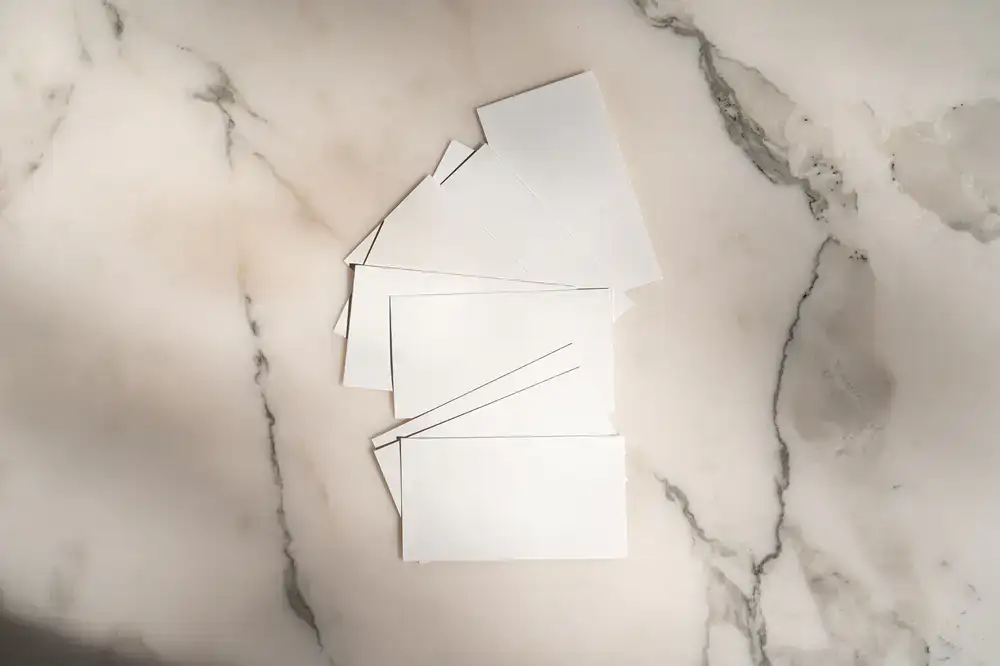 Minimalist business cards featuring a blind deboss technique