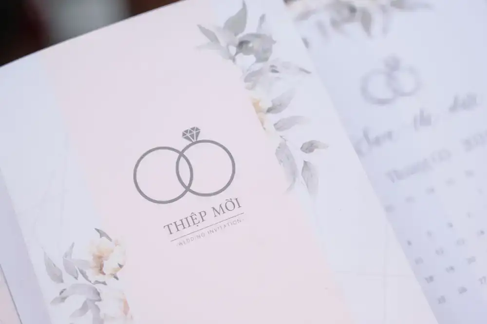 Minimalist letterpress wedding invitation with bold typography